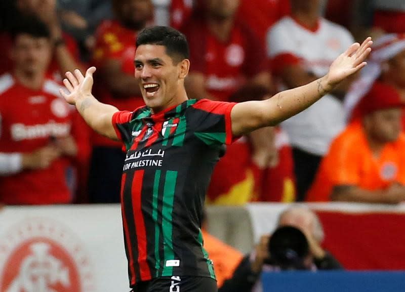 Foto de archivo de Lucas Passerini festejando un gol con Palestino en partido por la Copa Libertadores ante Internacional de Porto Alegre