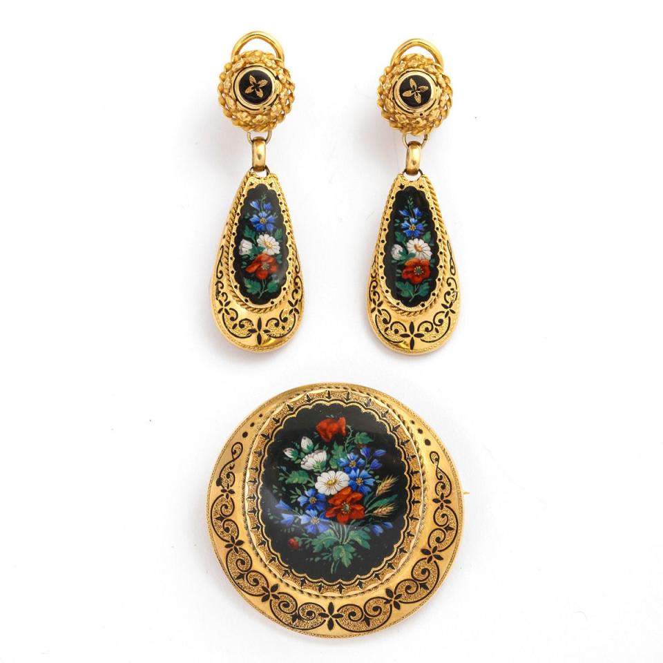 <p><strong>A La Vieille Russie</strong></p><p>alvr.com</p><p><a href="https://www.alvr.com/6456/antique-swiss-enamel-demi-parure/" rel="nofollow noopener" target="_blank" data-ylk="slk:Discover;elm:context_link;itc:0;sec:content-canvas" class="link ">Discover</a></p><p>An antique Swiss enamel and gold trio resplendent with floral bouquets that are intricately detailed is a sweet addition to a little black dress. </p>