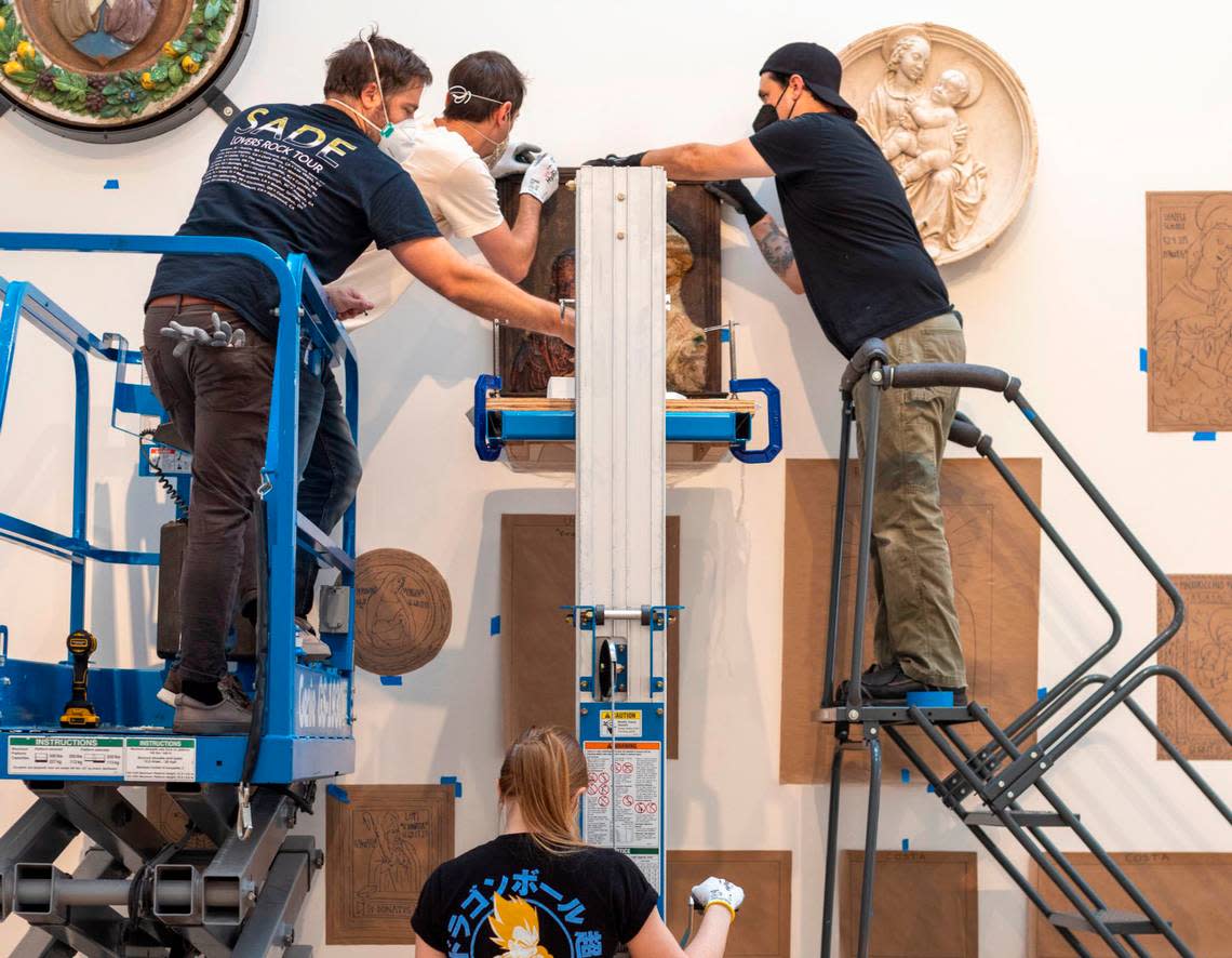 North Carolina Museum of Art Chief Art Handler Ian Larson, left, works with his team in the European Gallery on Tuesday, August 2, 2022 in Raleigh, N.C. The museum is undergoing a reinstallation of their collection and is set for a re-opening in October 2022.