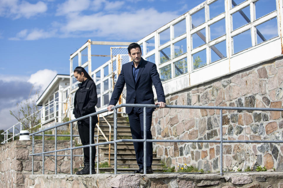 (L-R): Vinessa Vidotto as Special Agent Cameron Vo and Colin Donnell as Brian Lange