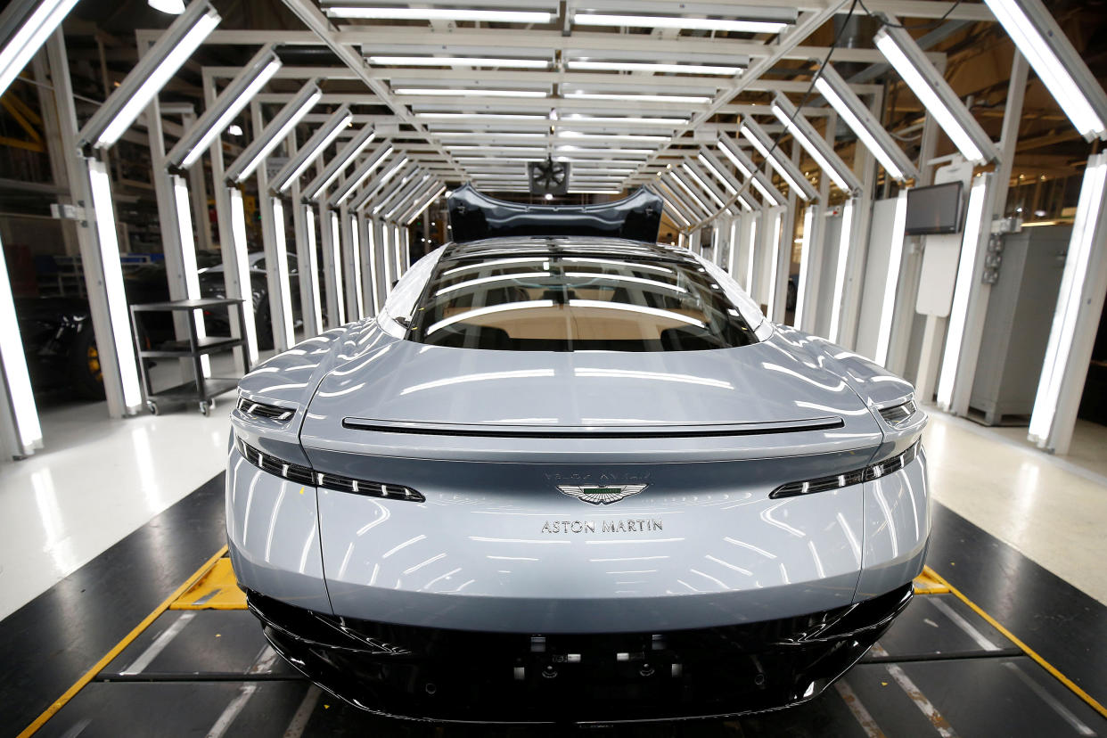 An Aston Martin car is seen at the production line at the company's world headquarters in Gaydon, Britain, February 14, 2019. Picture taken February 14, 2019. To match Insight BRITAIN-EU/AUTOS REUTERS/Andrew Yates