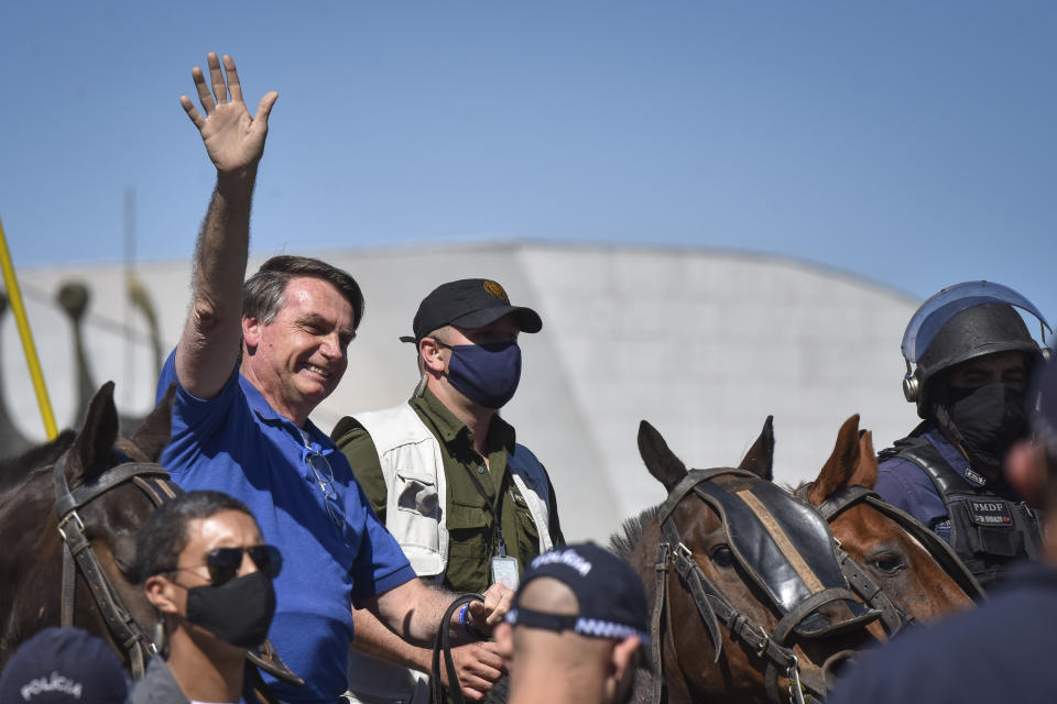 Bolsonaro en un evento sin mascarilla. (AP Foto/Andre Borges)