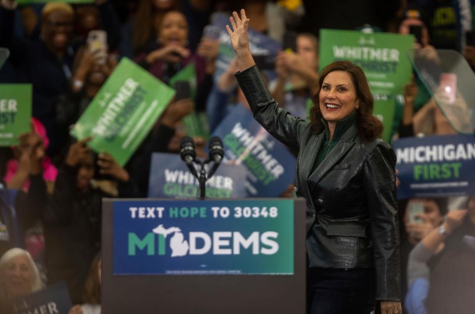 Michigan Gov. Gretchen Whitmer gets greeted with thunderous claps and cheers during a rally inside a gymnasium at Renaissance High School in Detroit on Oct. 29, 2022.