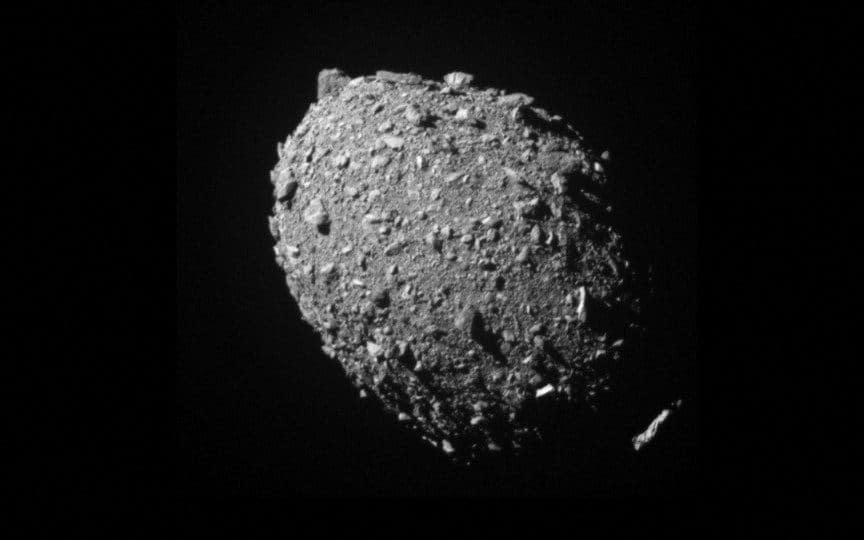 Asteroid moonlet Dimorphos as seen by the DART spacecraft 11 seconds before impact - NASA via REUTERS