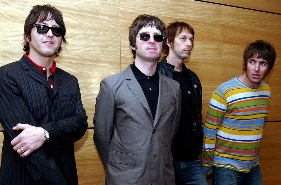 Members of British rock band Oasis pose for photos ahead of a concert in Hong Kong on Saturday, February 25, 2006. From left are, Gem Archer, Noel Gallagher, Andy Bell, and Liam Gallagher. (AP Photo/Lo Sai Hung)