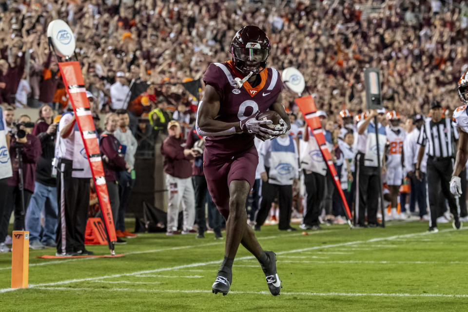 Virginia Tech's Da'Quan Felton makes a touchdown reception against Syracuse during the first half of an NCAA college football game Thursday, Oct. 26, 2023, in Blacksburg, Va. (AP Photo/Robert Simmons)