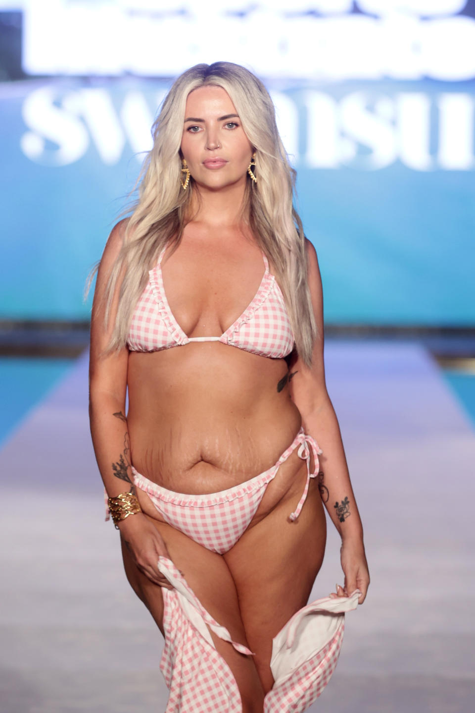 Landry wore two looks from her collaboration with Knix Swimwear for the runway. (Photo by John Parra/Getty Images for Sports Illustrated)