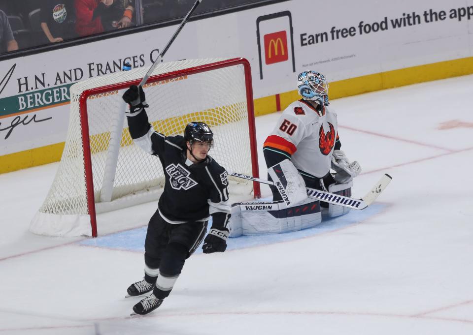 The Ontario Reign celebrate the game's only goal against the Coachella Valley Firebirds at Acrisure Arena in Palm Desert, Calif., Oct. 25, 2023.