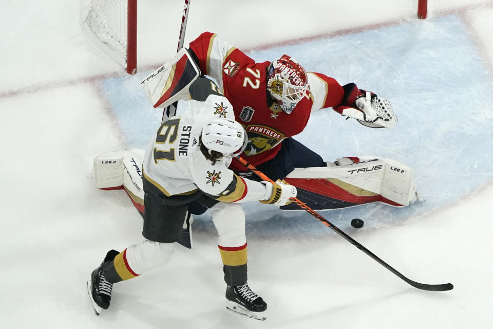 Vegas Golden Knights right wing Mark Stone (61) shoots to score a goal past Florida Panthers goaltender Sergei Bobrovsky (72) during the first period of Game 3 of the NHL hockey Stanley Cup Finals, Friday, June 9, 2023, in Sunrise, Fla. (AP Photo/Lynne Sladky)