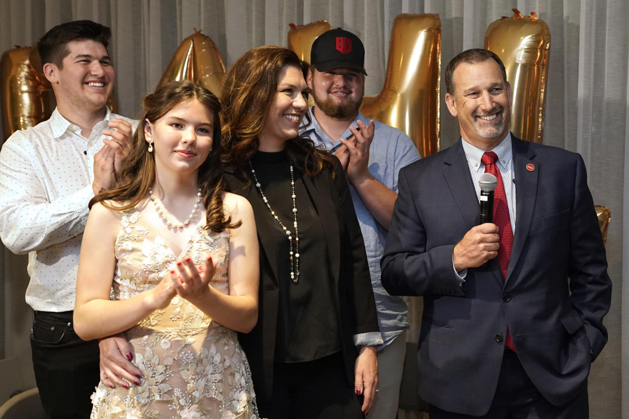 FILE - Republican gubernatorial candidate, state Sen. Brian Dahle, right, thanks supporters while accompanied by his family, from left to right, son Reagan, daughter Roslyn, wife Megan, and son Chase during a celebration at an election night gathering in Sacramento, Calif. June 7, 2022. Dahle is a long shot to unseat incumbent Democratic Gov. Gavin Newsom in the Nov. 8, 2022 election. (AP Photo/Rich Pedroncelli, File)