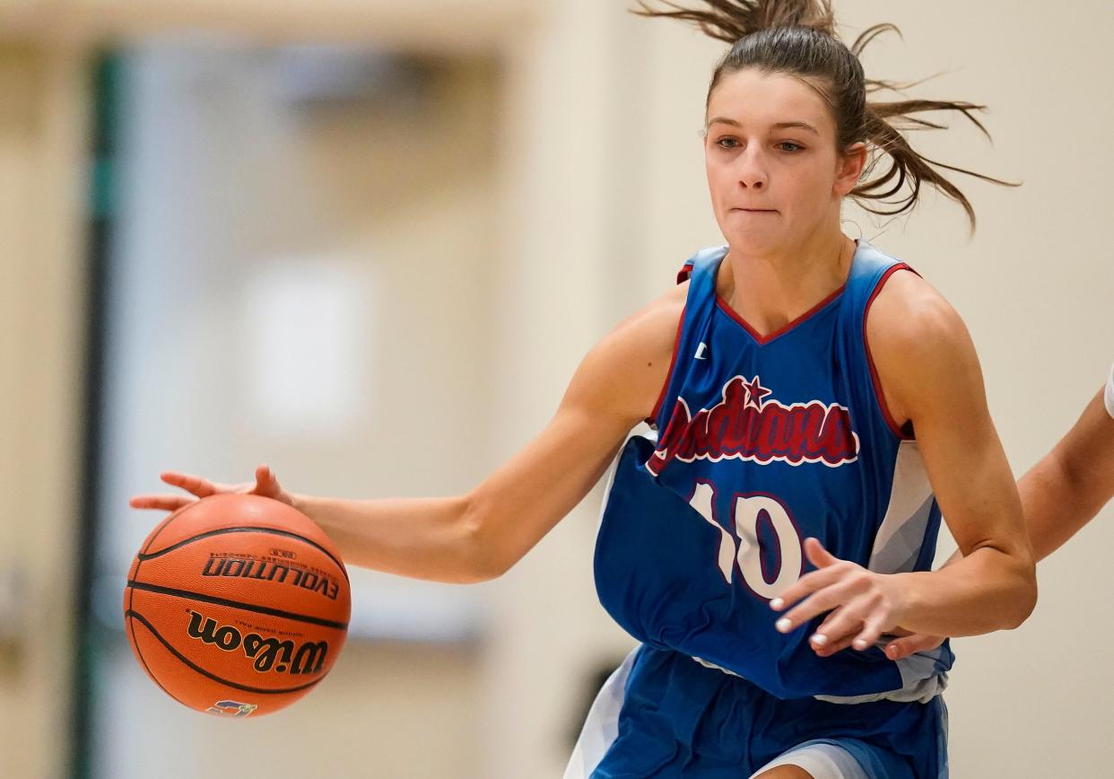 Indiana Junior All-Star Camryn Runner (10) rushes up the court Wednesday, June 7, 2023, during the Indiana All-Stars vs. Juniors girls game at Cathedral High School in Indianapolis. 