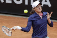 Poland's Iga Swiatek returns the ball to Czech Republic's Karolina Pliskova, during their final match at the Italian Open tennis tournament, in Rome, Sunday, May 16, 2021. (AP Photo/Gregorio Borgia)