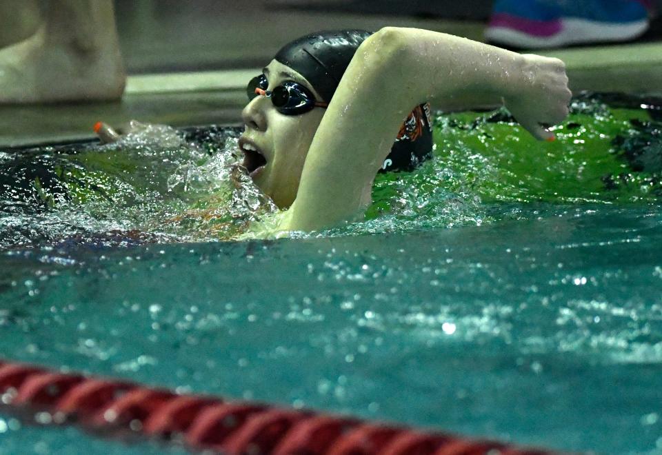 El Paso High's Allegra Rojas-Antillon celebrates her first place time during the 50 yard freestyle during the Region 1-5A swim meet, Saturday, Feb. 4, 2023, at Pete Ragus Aquatic Center. Rojas finished with 24.27.