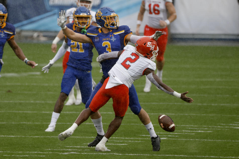 South Dakota State safety Joshua Manchigiah (3) defends on an incomplete pass to Sam Houston State wide receiver Ife Adeyi (2) during the first half of the NCAA college FCS Football Championship in Frisco, Texas, Sunday, May 16, 2021. (AP Photo/Michael Ainsworth)