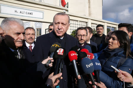 Turkish President Tayyip Erdogan talks to media after the Friday prayers in Istanbul, Turkey, December 28, 2018. Cem Oksuz/Presidential Press Office/Handout via REUTERS