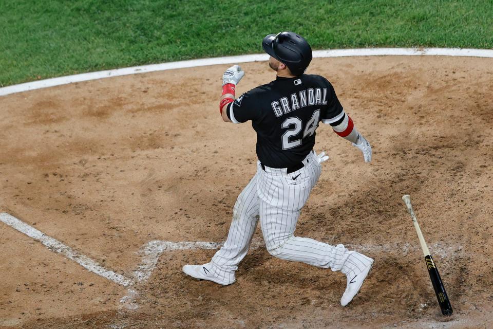 White Sox catcher Yasmani Grandal watches his solo home run against the Tigers during the seventh inning of the Tigers' 4-1 loss on Thursday, June 3, 2021, in Chicago.