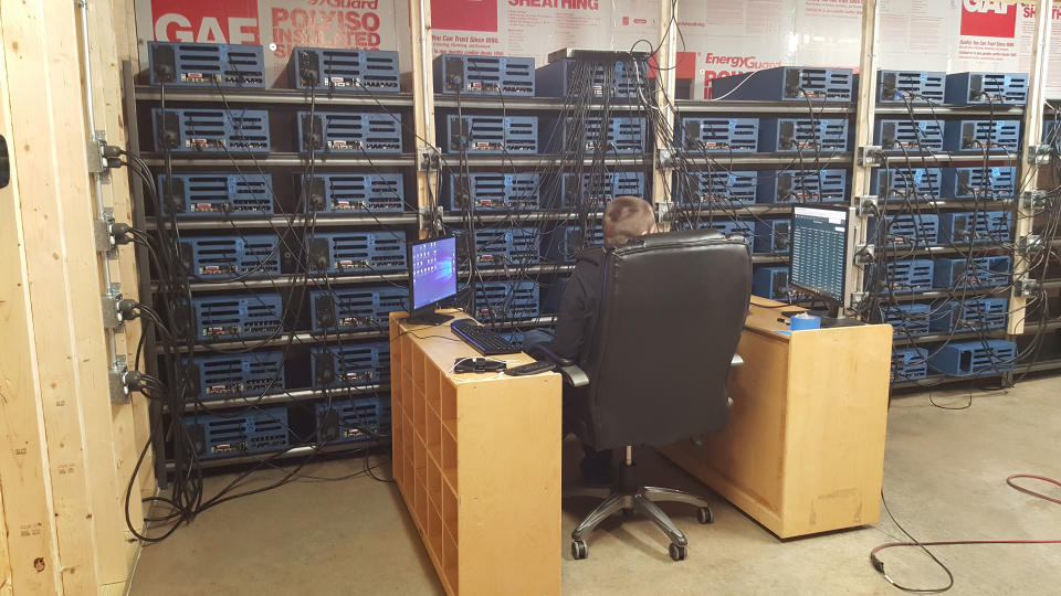 A cryptocurrency miner takes control of the mining rigs located in the data centre of the facility. Source: Foleum