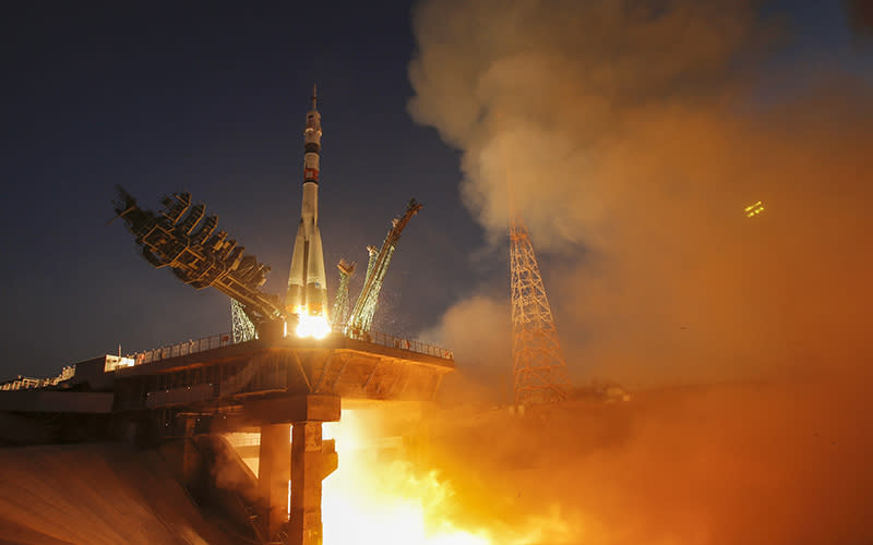 The spaceship carrying a new crew to the International Space Station blasts off