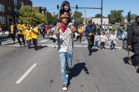 <p>Vic Mensa attended the Year of the Youth Peace Walk & Give Back event at Overton Elementary School in Chicago.</p>