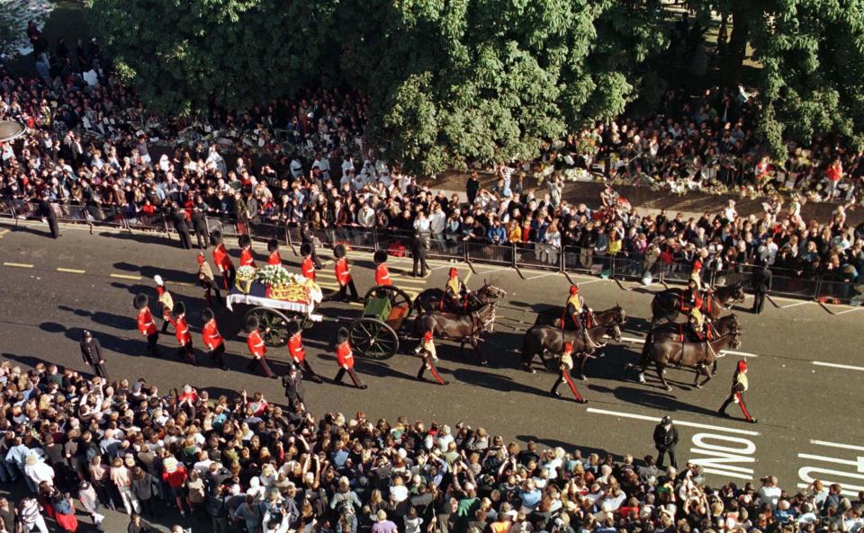 Diana’s funeral procession in front of crowdsBarry Batchelor/Shutterstock