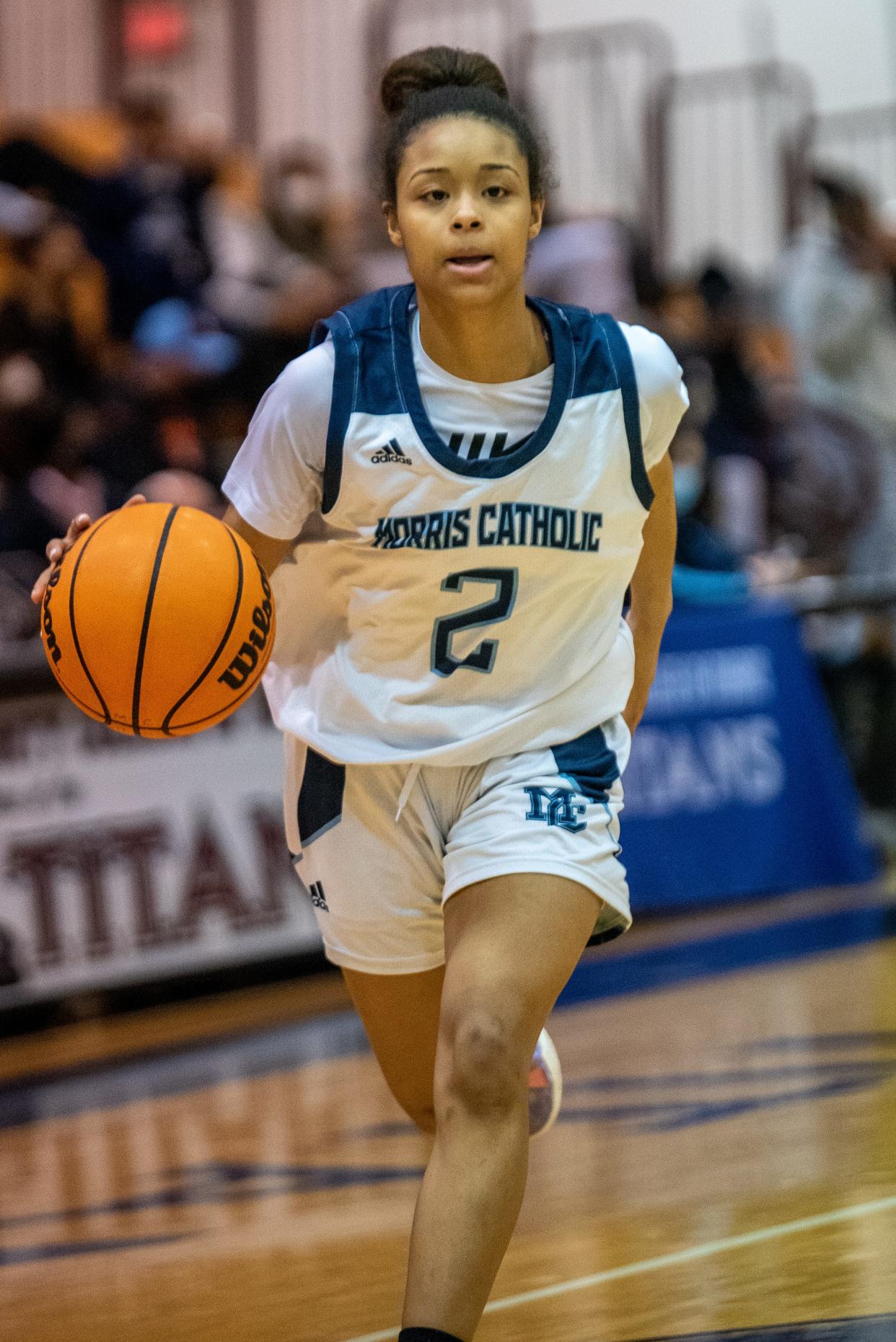 Morris Catholic plays Morristown in the final for the Morris County Basketball Tournament at County College of Morris on Friday February 25, 2022. MC #2 Mya Pauldo with the ball. 