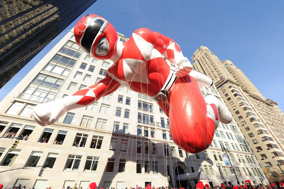 NEW YORK, NY - NOVEMBER 26:  The Red Mighty Morphin Power Ranger flies through New York Citys skyline bringing legendary action and adventure to the 89th Annual Macys Thanksgiving Day Parade on Thursday, November 26, 2015.  (Photo by Brad Barket/Getty Images for Saban Brands)