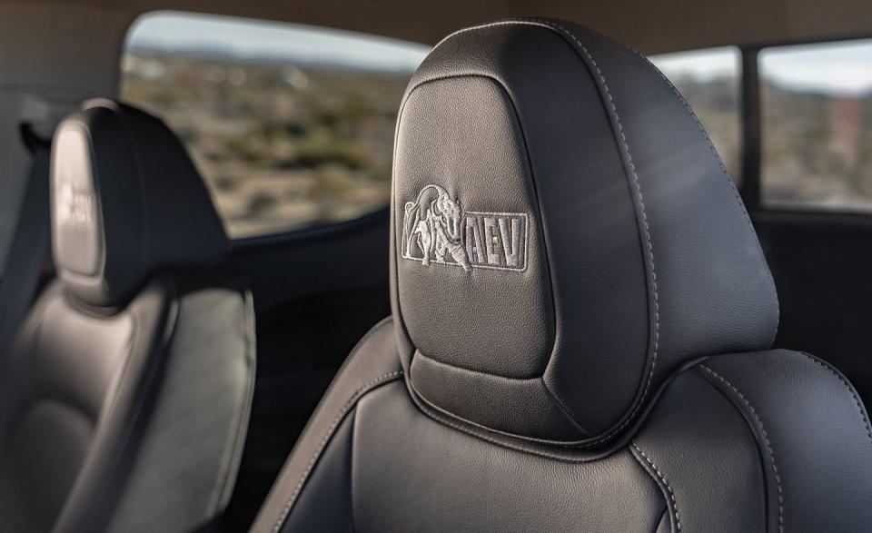 <p>AEV-embroidered front seats bring a subtle extra touch to the Bison's cabin. </p>