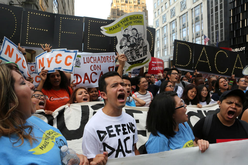 <p>People march and chant slogans against President Trump’s proposed end of the DACA program that protects immigrant children from deportation at a protest in New York City, Aug. 30, 2017. (Photo: Joe Penney/Reuters) </p>