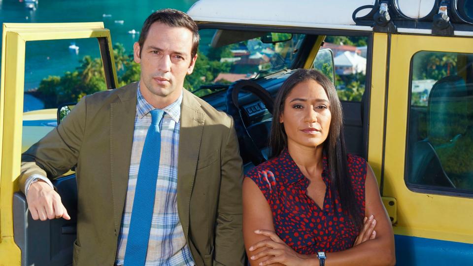 Ralf Little as DI Neville Parker and Josephine Jobert as DS Florence Cassell in Death In Paradise 