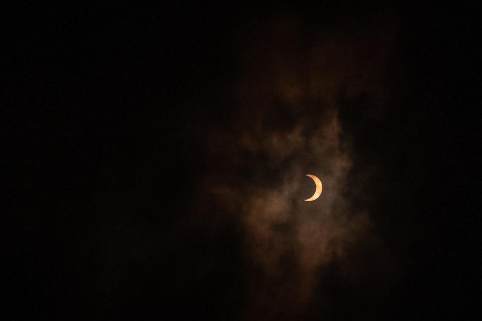 PHOTO: A solar eclipse over the sky of Planetarium of Bogota, Columbia, Oct. 14, 2023. (Diego Cuevas/Getty Images)