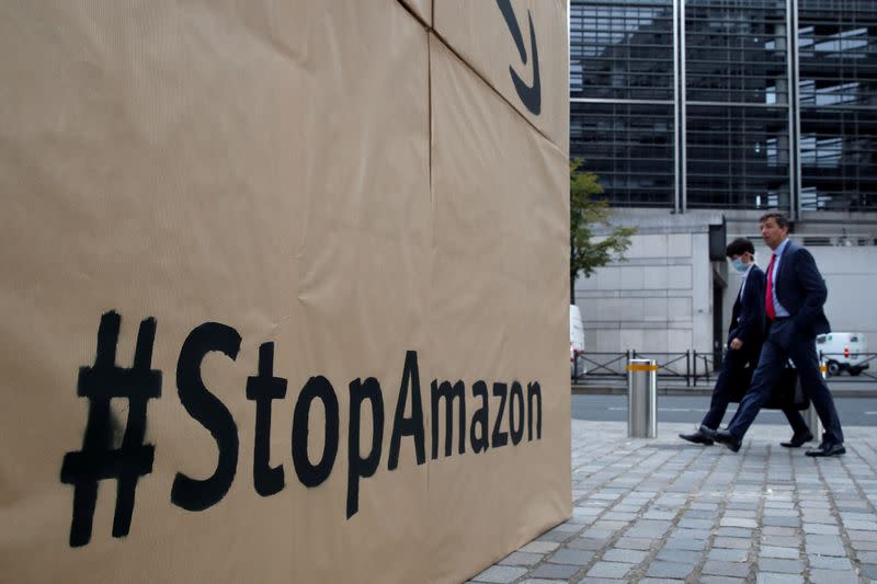 FILE PHOTO: Climate activists attend a demonstration against Amazon near the Bercy Finance Ministry in Paris