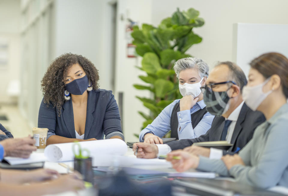 Even for roles in sectors that can conceivably be accomplished remotely — software development, marketing, sales — have seen some of the highest swings in vaccination mandates. (Photo: Getty)