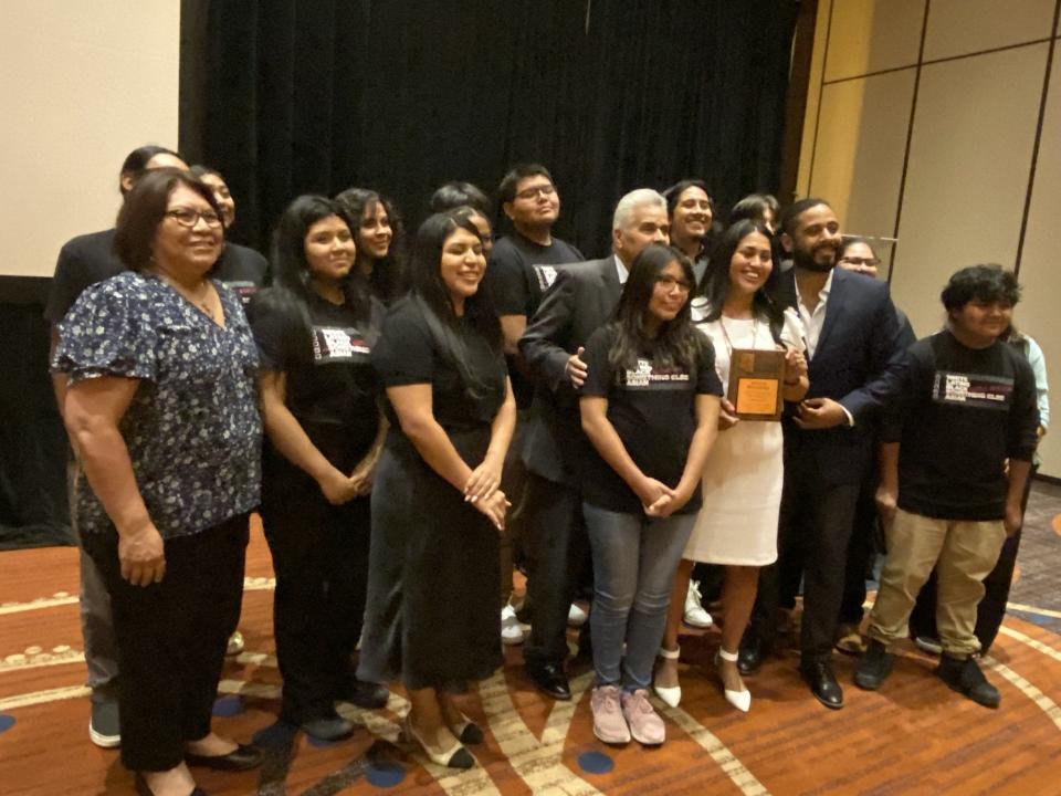 Angela Willeford, dressed in white, poses with Salt River Pima-Maricopa Indian Community leaders and members of the tribe's youth council who spearheaded a get-out-the-vote drive as she received a recognition award on July 14, 2023, during the 75th anniversary of the Native right to voce celebration.