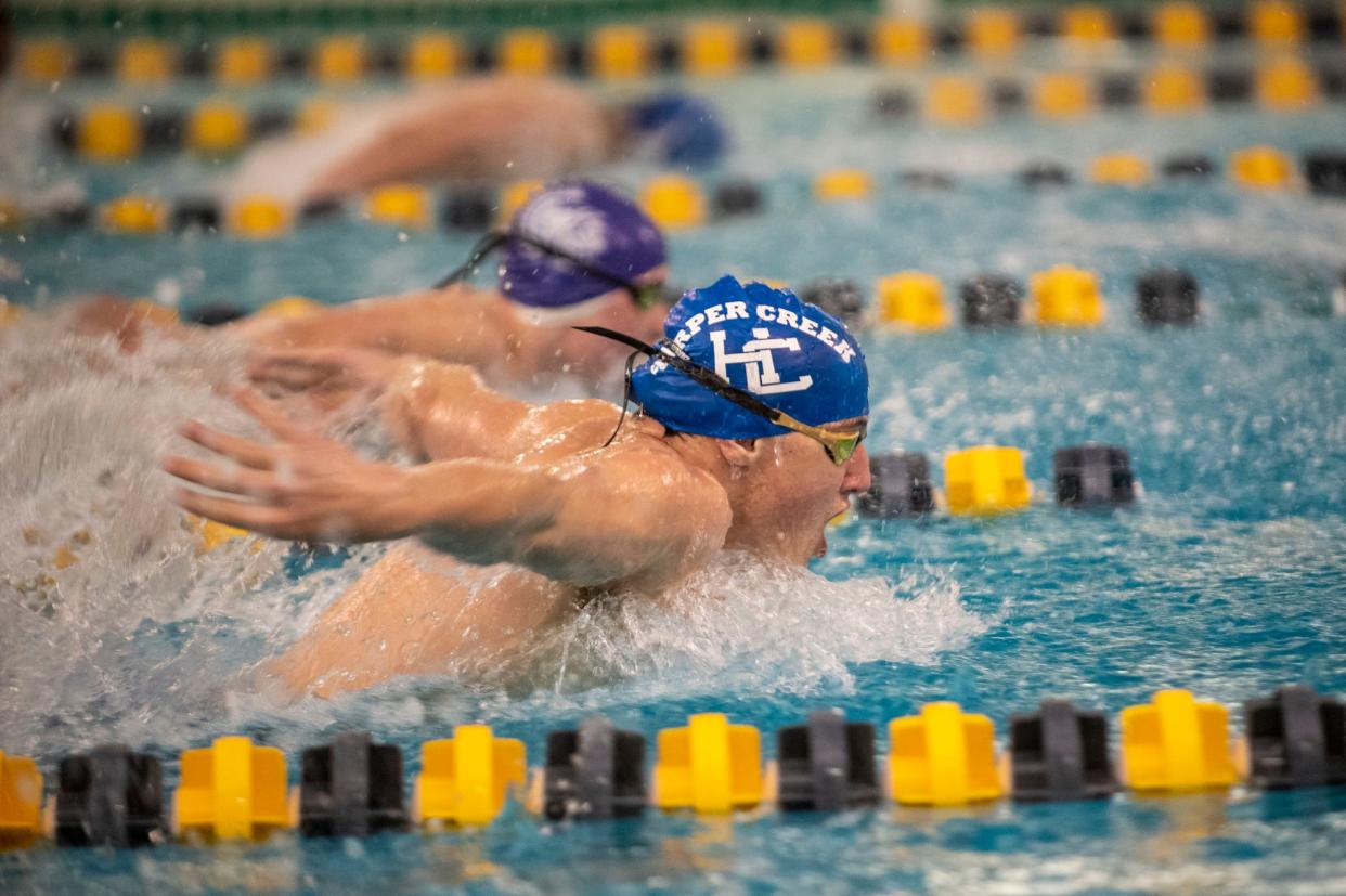 Harper Creek's Carson Wager competes in the 100-yard butterfly on Saturday, Feb. 13, 2021 during the All-City Swim Meet at Battle Creek Central High School.