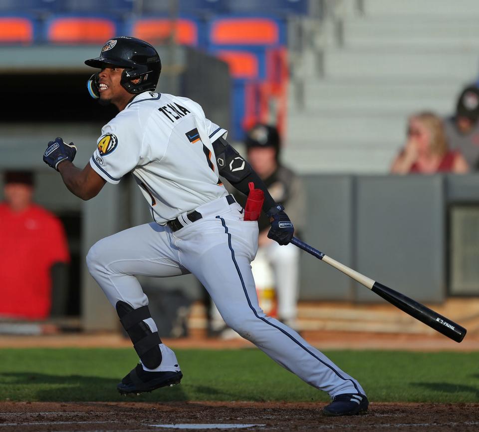 RubberDucks shortstop Jose Tena watches his single to left during the third inning against the Erie SeaWolves at Canal Park in 2022.