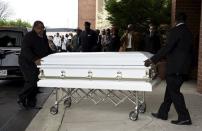 The casket of Freddie Gray, 25, a Baltimore black man who died in police custody, arrives at New Shiloh Baptist Church in Baltimore April 27, 2015. REUTERS/Sait Serkan Gurbuz