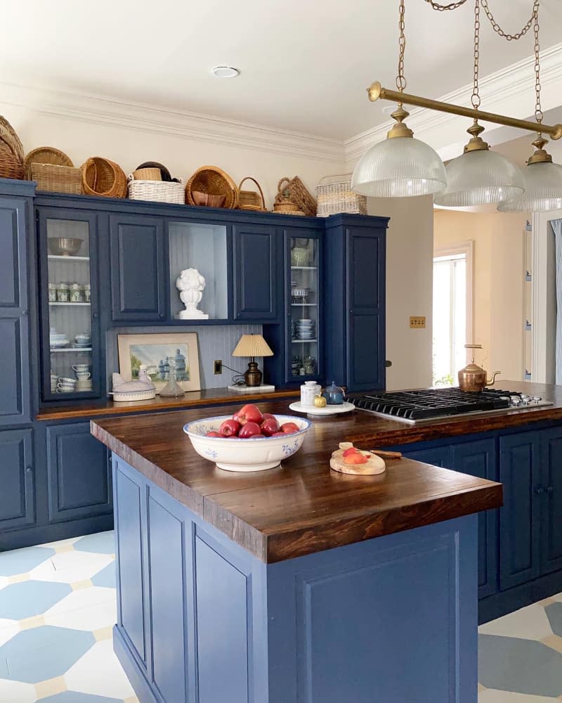 Blue painted cabinets in newly renovated kitchen.