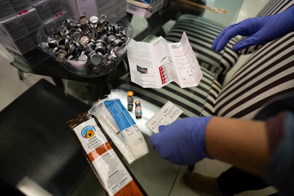 At the R3 Recovery Center in Wilkesboro, N.C., Emily Church displays the materials that come in an opioid overdose kit, including two vials of Naloxone and an instruction manual. “I can get behind this because I’ve seen way too much death,” Church says.