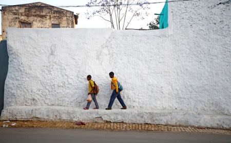 Students walk within the walled city of Harar, Ethiopia, February 24, 2017. REUTERS/Tiksa Negeri