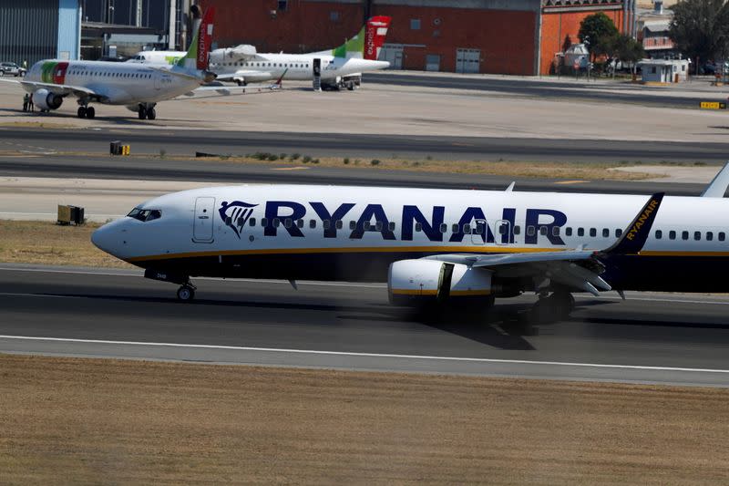 FILE PHOTO: A Ryanair plane taxis at Lisbon's airport