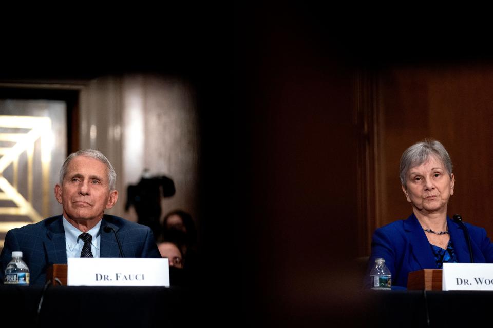 Anthony Fauci, director of the National Institute of Allergy and Infectious Diseases, and Janet Woodcock, acting commissioner of the FDA, appear before the Senate Health, Education, Labor and Pensions Committee on July 20.