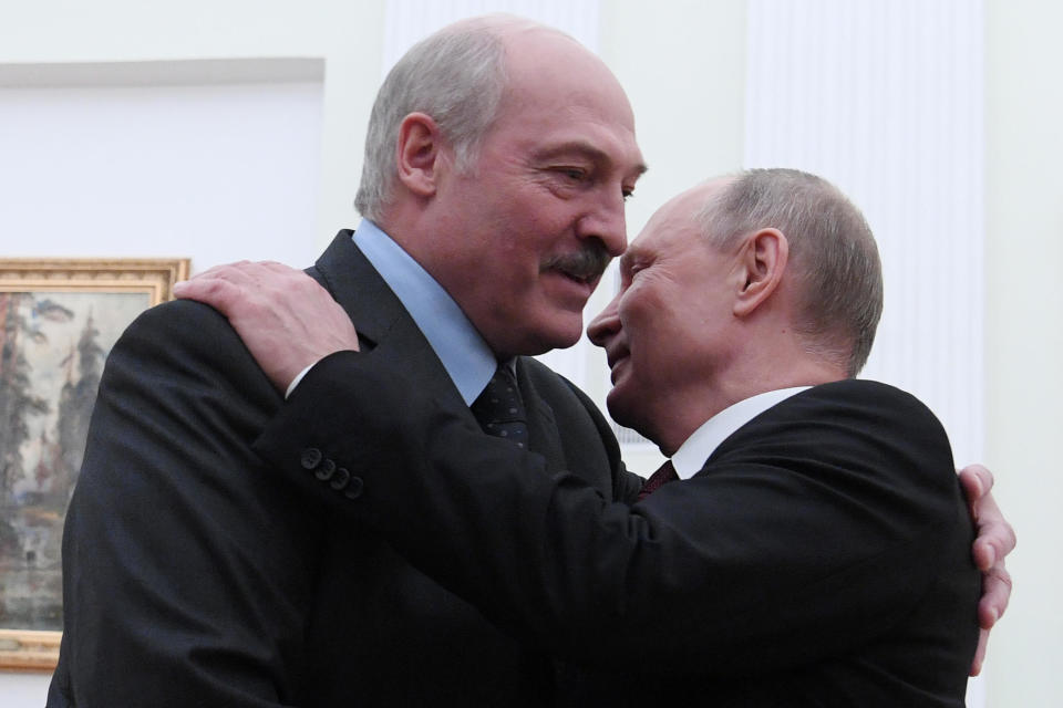 Russian President Vladimir Putin, right, welcomes his Belarus counterpart Alexander Lukashenko to a meeting at the Kremlin, in Moscow, on December 29, 2018.  / Credit: KIRILL KUDRYAVTSEV/AFP/Getty