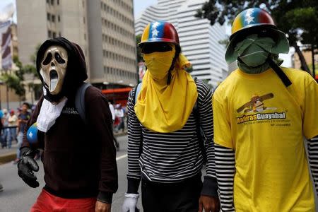 Opposition supporters rally against President Nicolas Maduro in Caracas, Venezuela, May 18, 2017. REUTERS/Carlos Garcia Rawlins