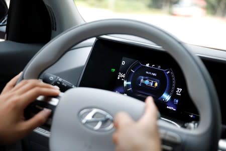 A small display shows Hyundai Motor's Nexo hydrogen car's realtime energy flow during a demonstration in Seoul