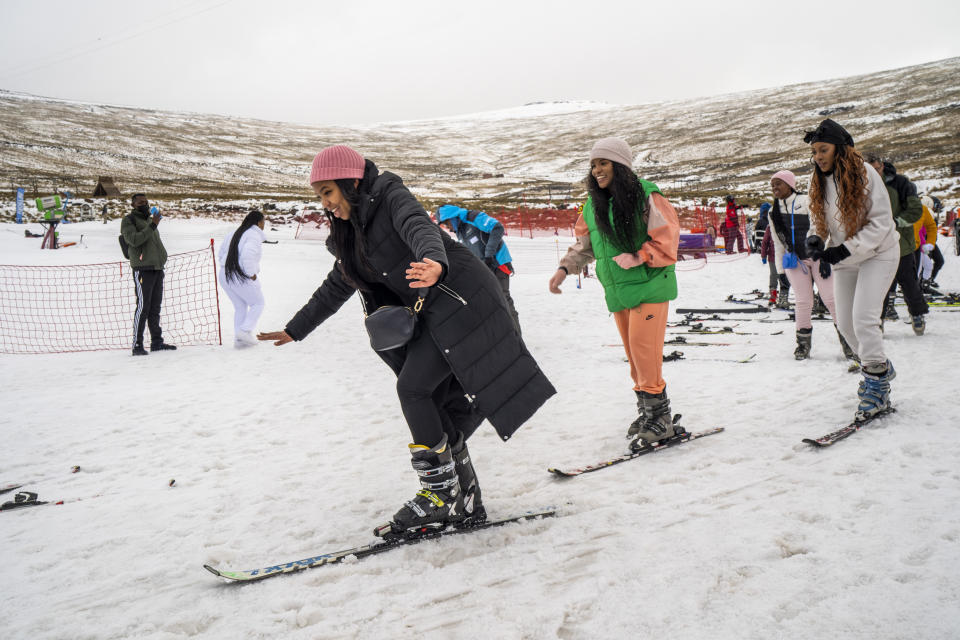 First time skiers take a lesson at the Afriski ski resort near Butha-Buthe, Lesotho, Saturday July 30, 2022. While millions across Europe sweat through a summer of record-breaking heat, Afriski in the Maluti Mountains is Africa's only operating ski resort south of the equator. It draws people from neighboring South Africa and further afield by offering a unique experience to go skiing in southern Africa. (AP Photo/Jerome Delay)