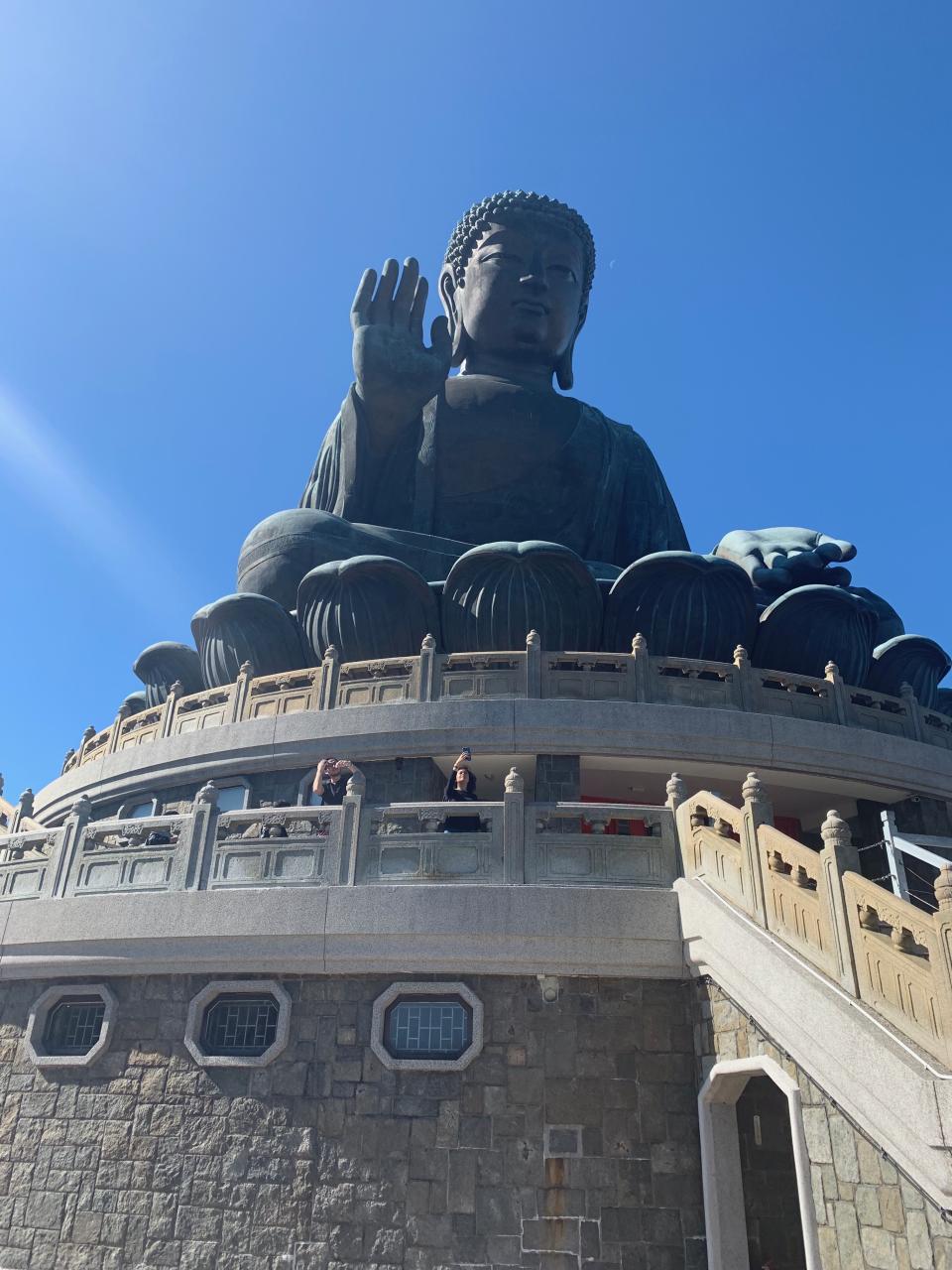 The cable car, which can have a glass-bottom if you like, brings you all the way to Ngong Ping Village. From there you can stroll to the the Big Buddha and Po Lin Monastery. Photo: Yahoo Lifestyle Australia