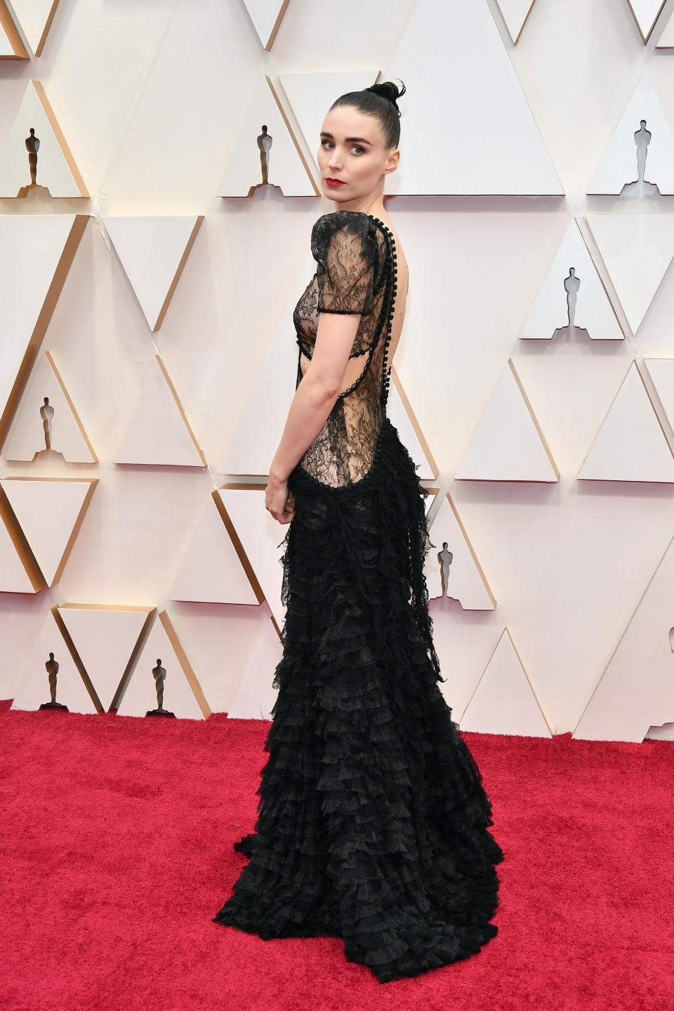 Wearing a black lace gown. <em>[Photo: Getty]</em>