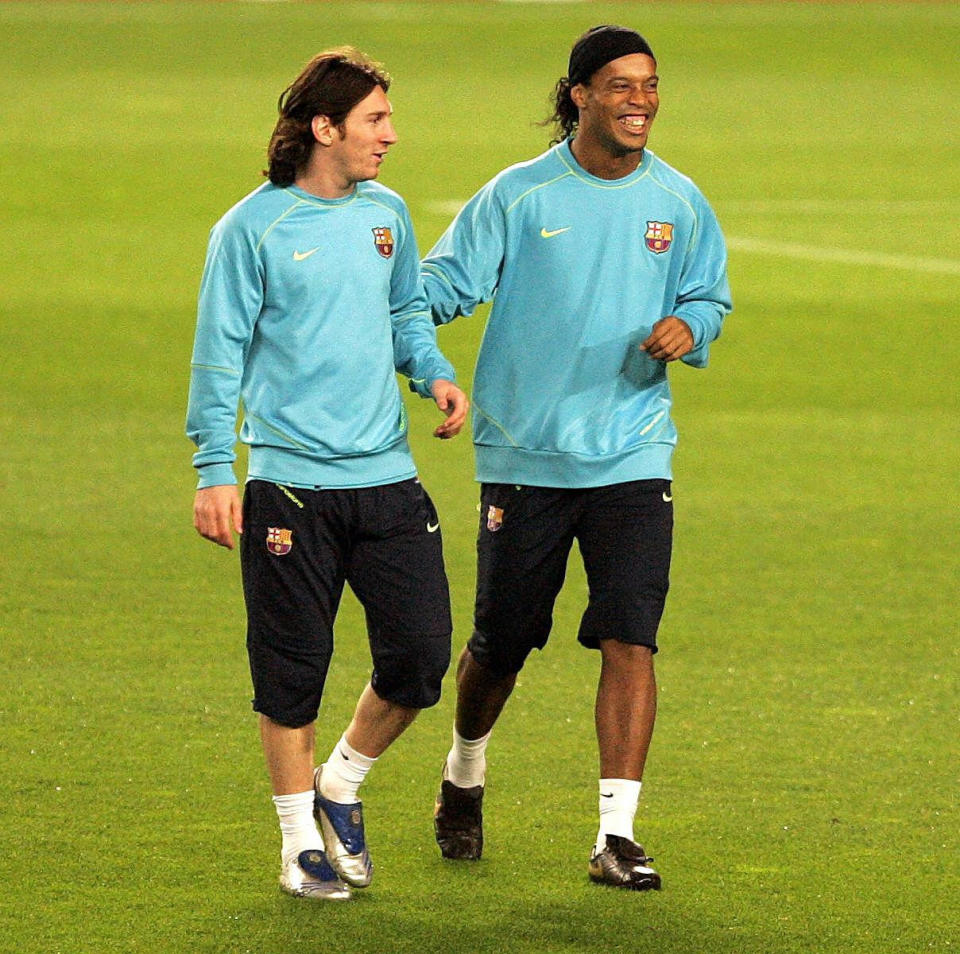 Barcelona's Ronaldinho (right) with Lionel Messi during a training session at the Camp Nou in Barcelona, Spain.