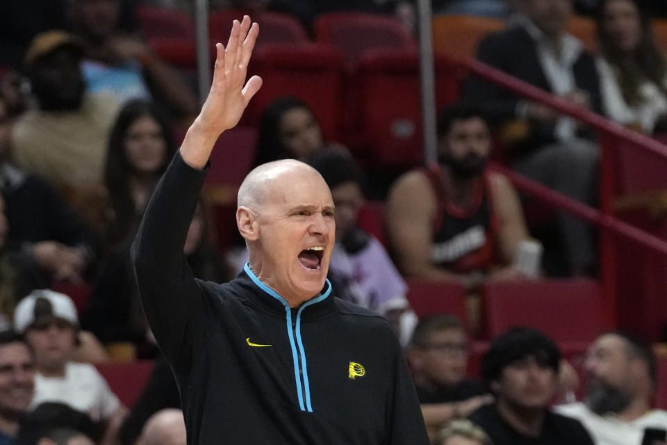 Indiana Pacers coach Rick Carlisle gestures during the first half of the team's NBA basketball game against the Miami Heat, Saturday, Dec. 2, 2023, in Miami. (AP Photo/Lynne Sladky)