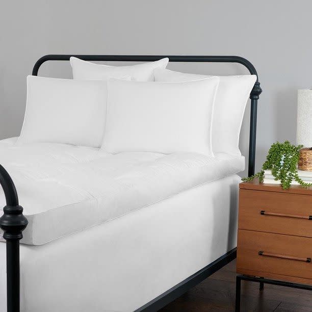 <p><a href="https://go.redirectingat.com?id=74968X1596630&url=https%3A%2F%2Fwww.walmart.com%2Fip%2FStandard-Textile-Down-Featherbed-White-Queen%2F2088179213&sref=https%3A%2F%2Fwww.goodhousekeeping.com%2Fhome-products%2Fa25576306%2Fbest-mattress-toppers%2F" rel="nofollow noopener" target="_blank" data-ylk="slk:Shop Now;elm:context_link;itc:0" class="link ">Shop Now</a></p><p>Down Featherbed</p><p>$300.00</p><p>walmart.com</p><span class="copyright">Standard Textile</span>